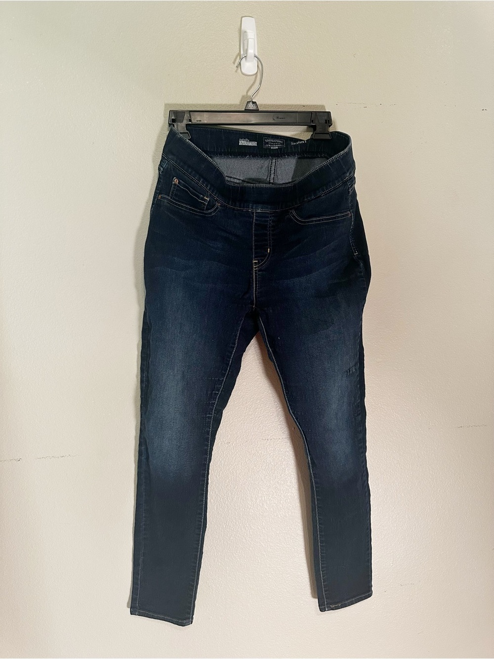 Levi Strauss & Co. women's skinny jeans featuring a "Totally Shaping" waistband